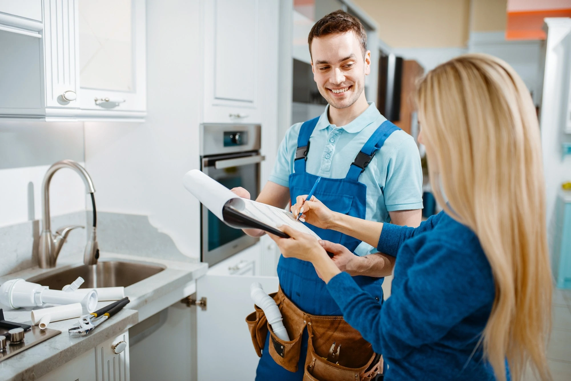 Plumber With Female Client