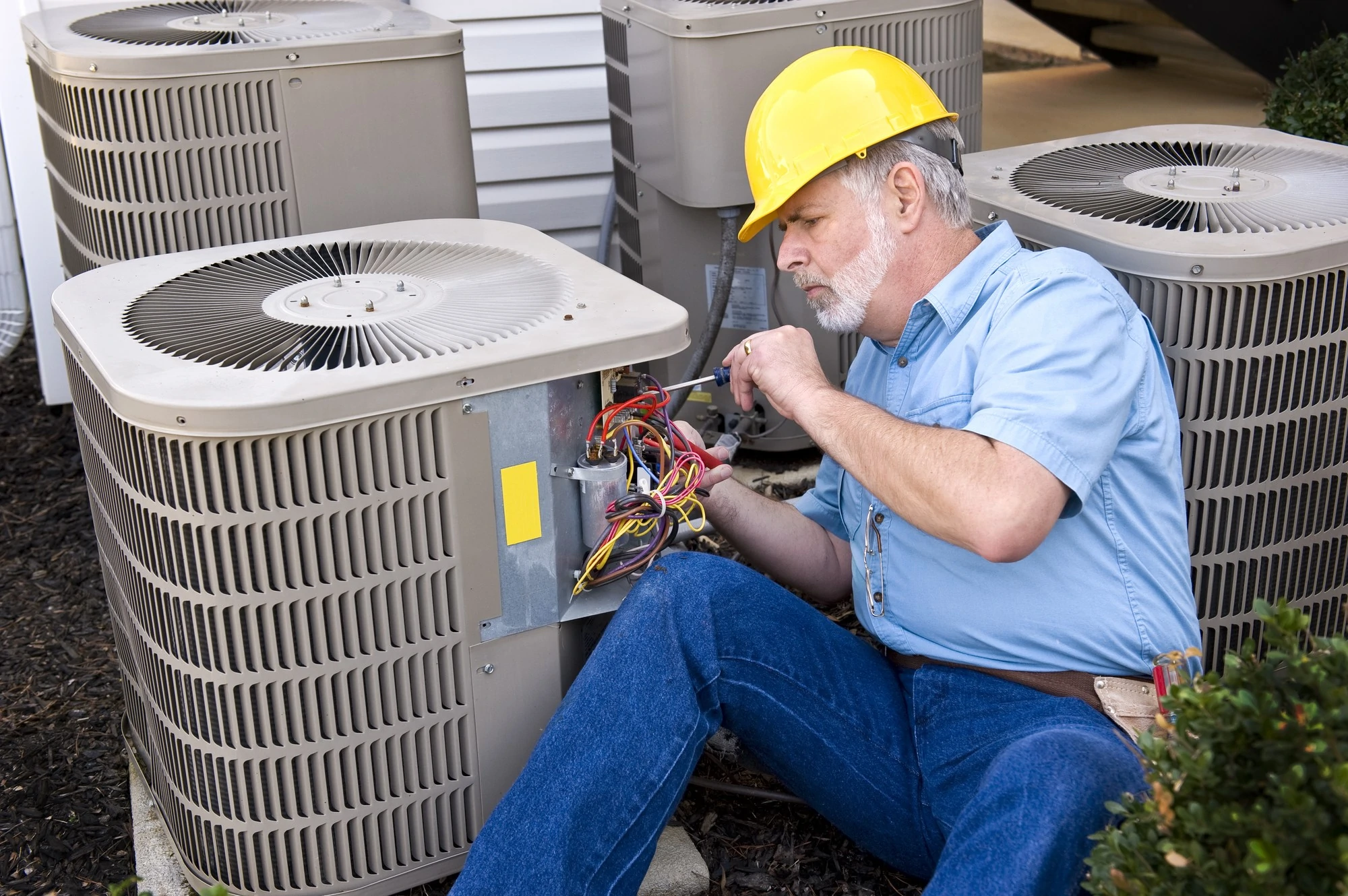 Air Conditioning Repairman At Work